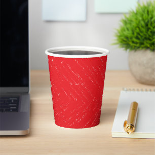 A symmetrical pattern featuring red, orange, and p paper cups