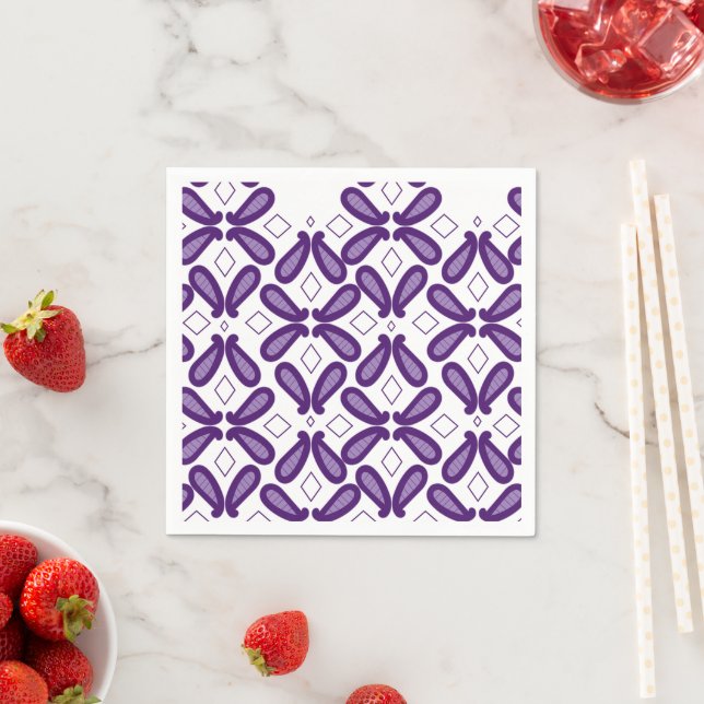 A symmetrical pattern featuring white and purple m napkin (Insitu)