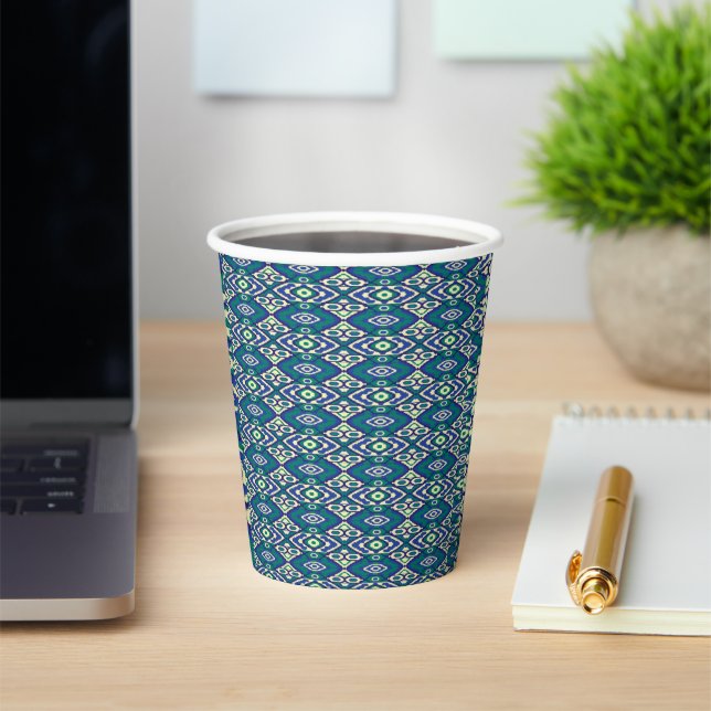 A symmetrical pattern of blue motifs on a textile  paper cups (Insitu)