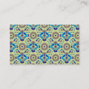 A symmetrical textile design featuring blue and or business card