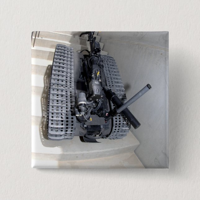A Talon 3B robot unit climbing a flight of stai 2 Inch Square Button (Front)