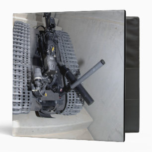 A Talon 3B robot unit climbing a flight of stai Binder