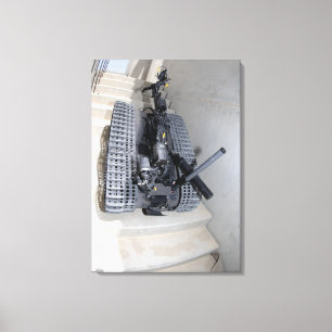 A Talon 3B robot unit climbing a flight of stai Canvas Print