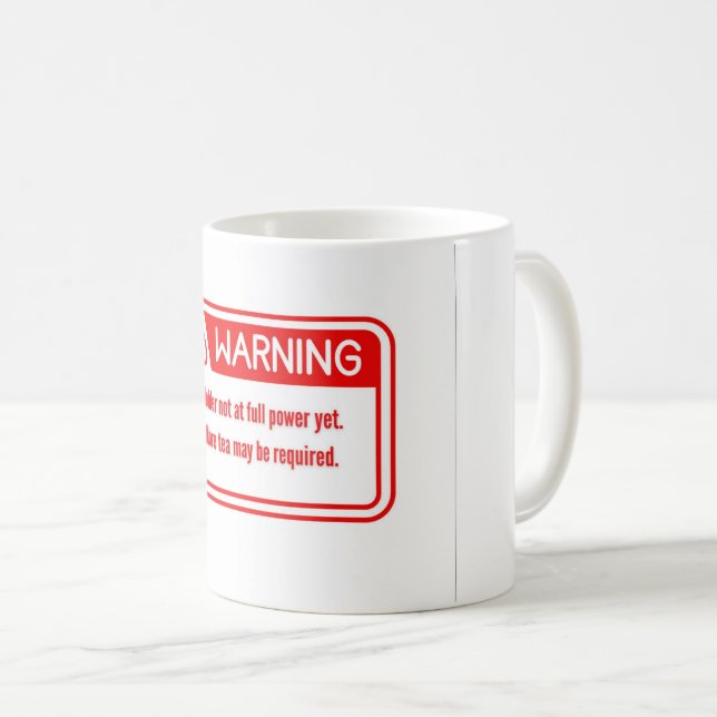 A tea cup with a funny and distinctive warning des (Front Right)