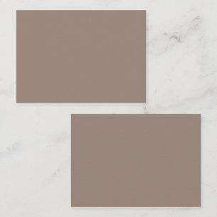 A textured background of various shades of brown,  appointment card