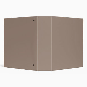 A textured background of various shades of brown,  binder