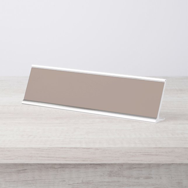 A textured background of various shades of brown,  desk name plate (Front)