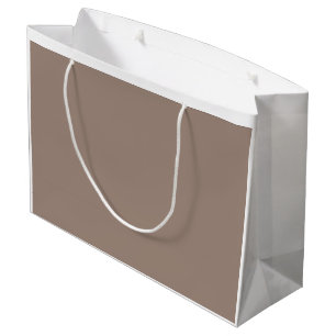 A textured background of various shades of brown,  large gift bag