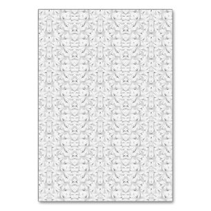 A textured pattern featuring white and grey hues, table number