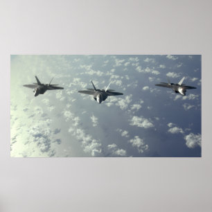 A three-ship formation of F-22 Raptors Poster