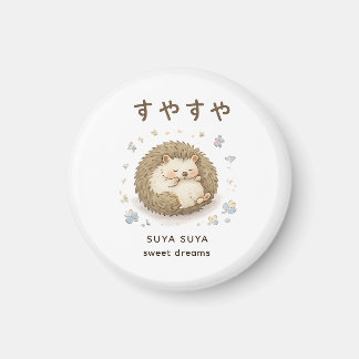 A tiny hedgehog enjoying a peaceful nap magnet