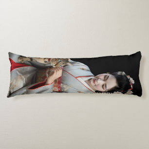 A Tortoiseshell Cat Resting Paws on a Maiko Body Pillow