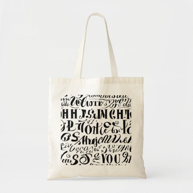 A tote bag with black coloured text on it (Front)