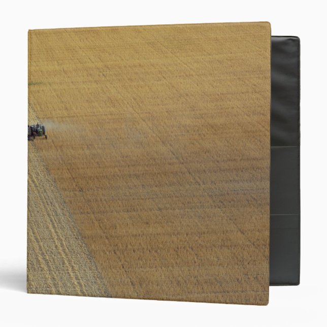 A tractor harvesting binder (Front/Inside)