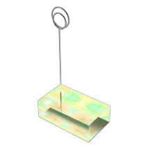A transparent rectangular block with a pastel 