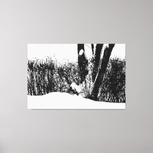 A Tree And Shrubs In Snow Canvas Print