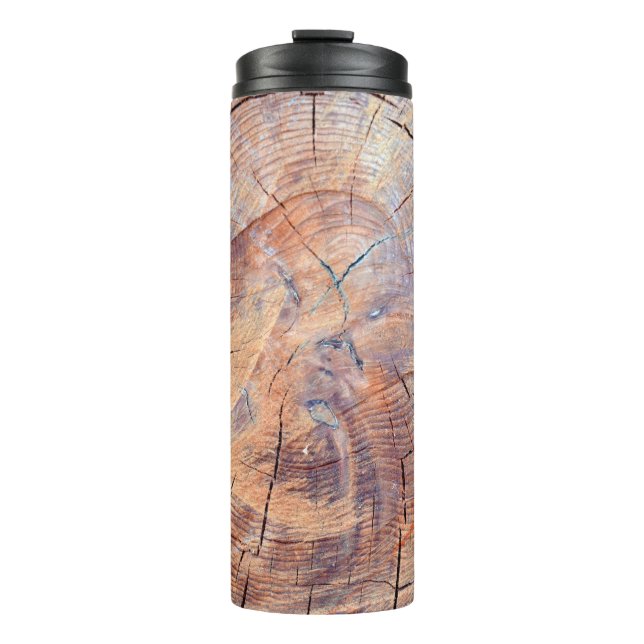A tree in a cut. Logs lumber in the woods. Texture Thermal Tumbler (Front)