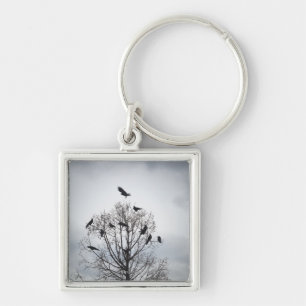 A tree in which many crows have rest keychain