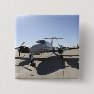 A  UC-12F King Air aircraft 2 Inch Square Button