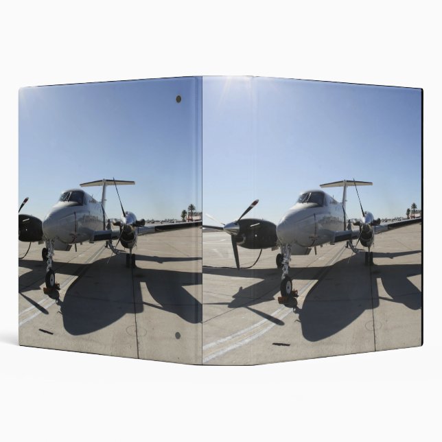 A  UC-12F King Air aircraft Binder (Background)