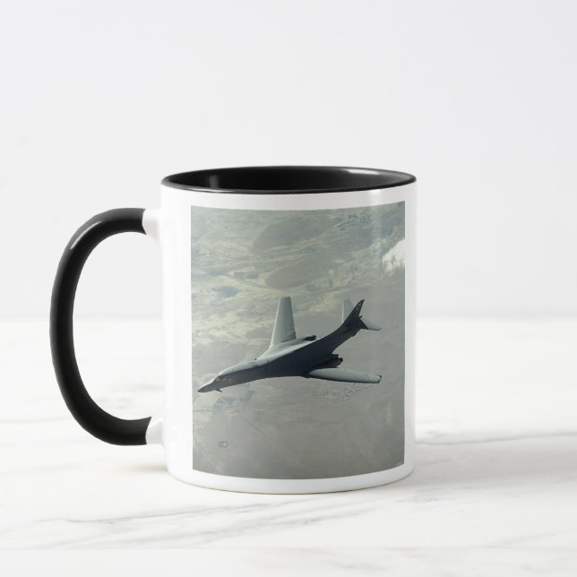 A US Air Force  B-1B Lancer on a combat patrol 2 Mug (Left)