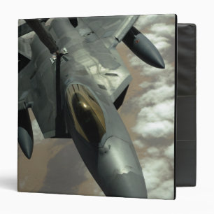 A US Air Force F-22 Raptor is refueled by a KC- Binder