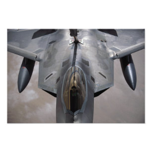 A US Air Force F-22 Raptor is refueled Photo Print