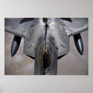 A US Air Force F-22 Raptor is refueled Poster