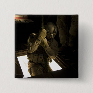 A US Air Force pararescueman begins his descent 2 Inch Square Button