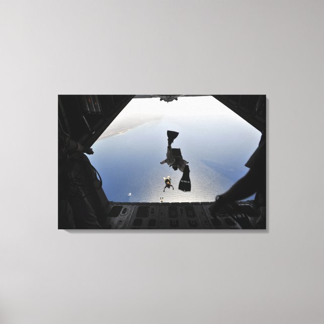 A US Air Force pararescueman jumping out Canvas Print (Front)