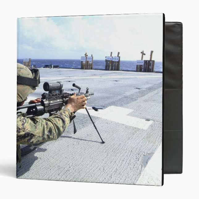 A US Marine adjusting his weapon Binder (Front/Inside)