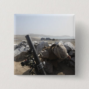 A US Marine fires a mortar in Salinas, Peru 2 Inch Square Button