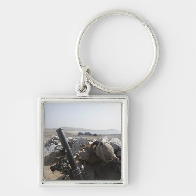 A US Marine fires a mortar in Salinas, Peru Keychain (Front)
