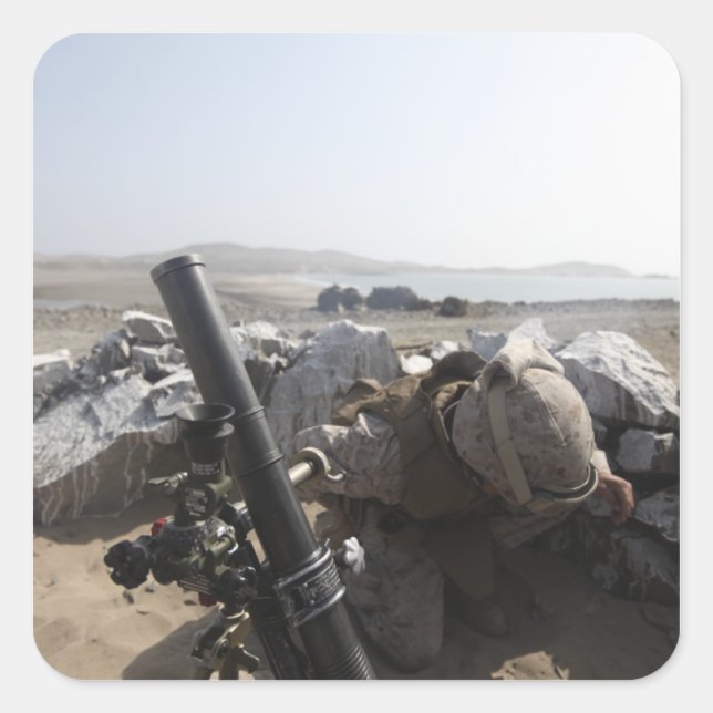A US Marine fires a mortar in Salinas, Peru Square Sticker (Front)