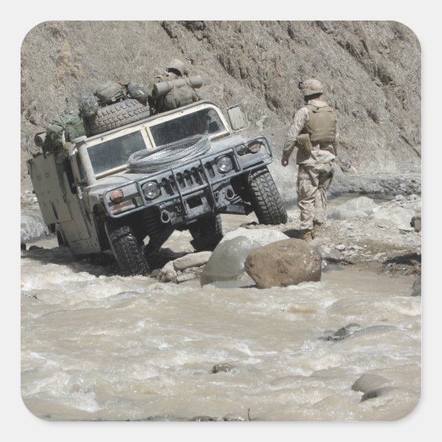 A US Marine guiding the driver of a Humvee Square Sticker (Front)