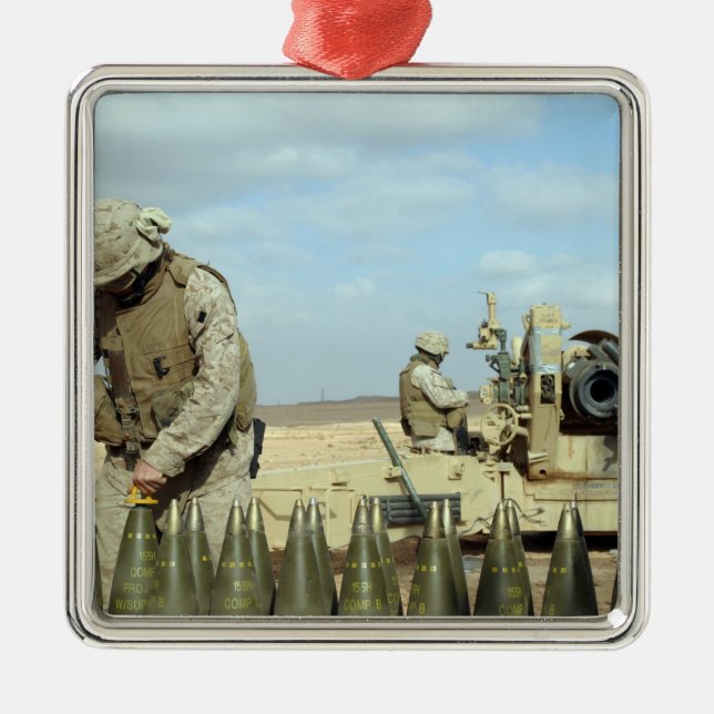 A US Marine prepares howitzer rounds to be fire Metal Ornament (Front)