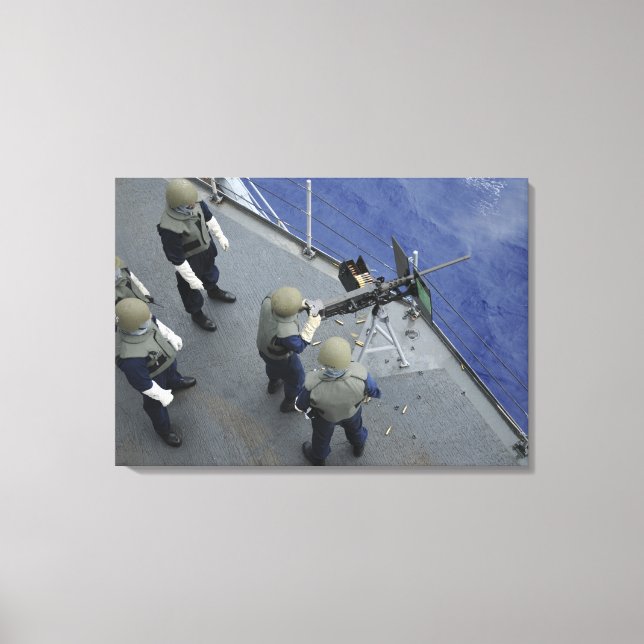 A US Sailor fires a 50-calibre M2HB Canvas Print (Front)