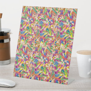 a very colourful abstract pattern with lots of col pedestal sign