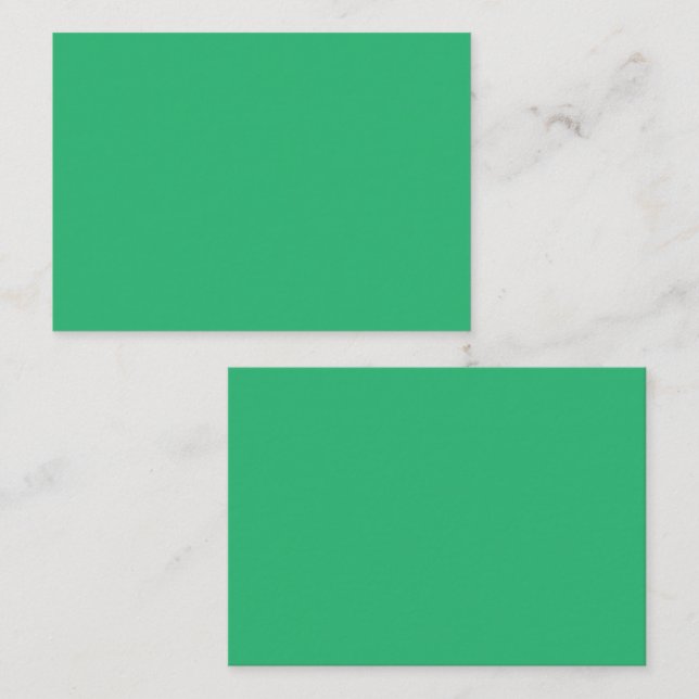 A vibrant green leaf with prominent veins and a de appointment card (Front/Back)