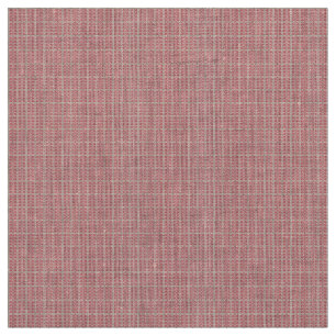 A vibrant red rose with dewdrops gently resting on fabric