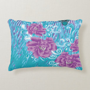A vibrant textile design featuring purple and turq accent pillow