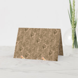 A vintage floral pattern with intricate brown desi invitation