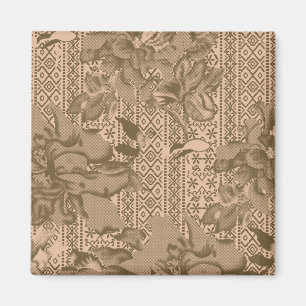 A vintage floral pattern with intricate brown desi magnet