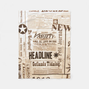 A vintage old news paper print typography fleece blanket