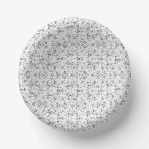 A visually striking white and black patterned wall paper plate