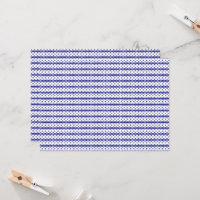 A vivid blue sky with scattered white clouds.