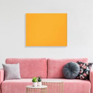 A vivid orange square surrounded by a white border canvas print