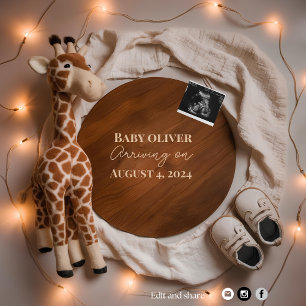 A warm cozy giraffe pregnancy announcement 