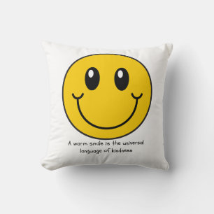 A warm smile is the universal language of kindness throw pillow