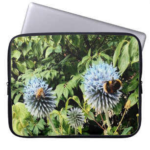 A wasp and bee , on blue flowers laptop sleeve